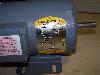 Baldor 1/3HP, 208-230/460 Volt, 3 Phase, 60HZ motor side view